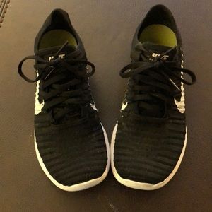 Nike black flyknit sneakers